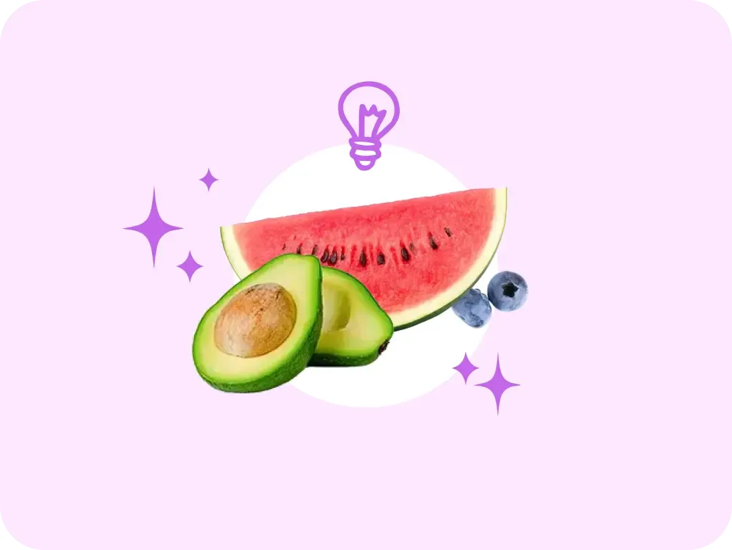 Seasonal produce: a watermelon slice, an avocado and blueberries